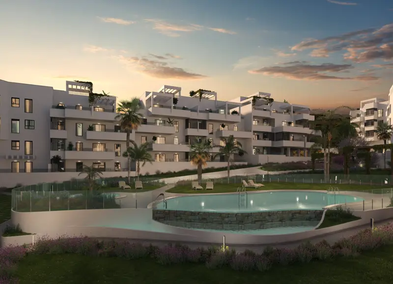 Edificios del residencial Limonar al atardecer junto a la piscina